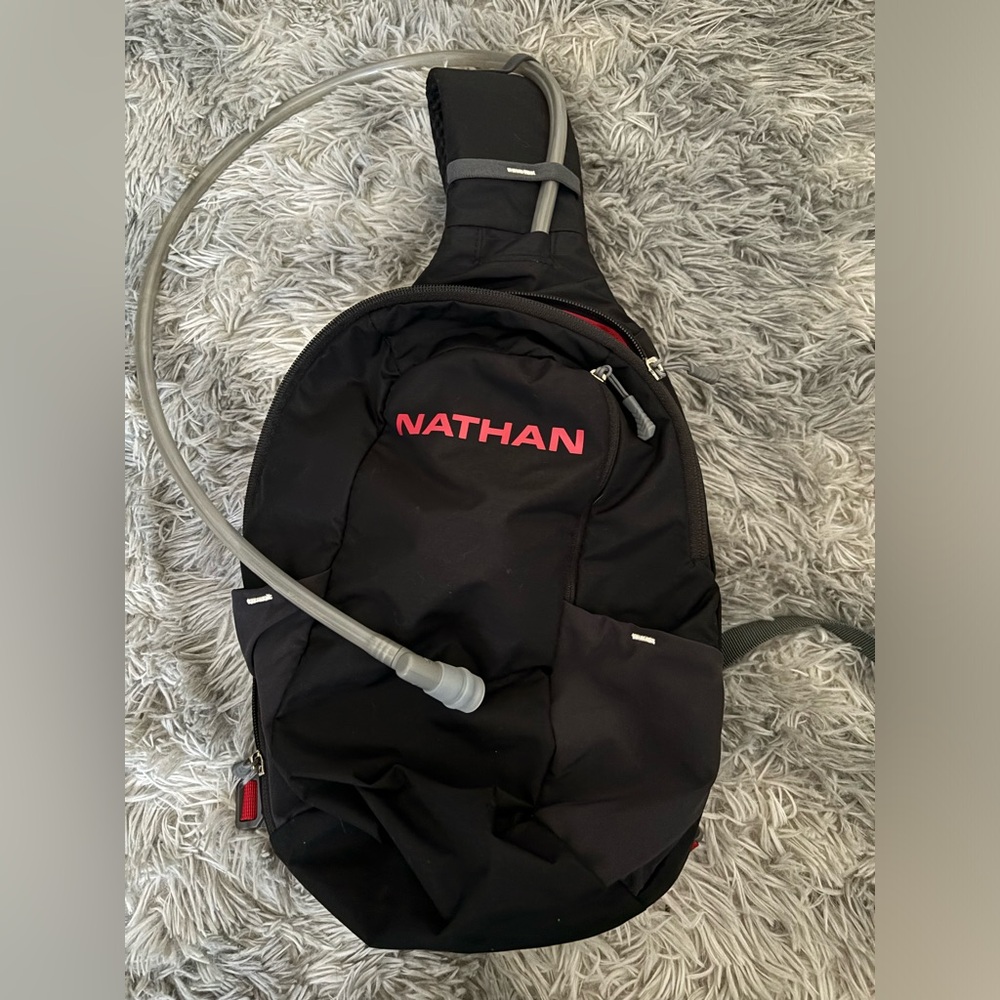 Nathan hiking/running sling pack with hydration system